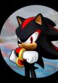Shadow the Hedgehog poses confidently, showcasing his iconic black and red design while holding a Chaos Emerald.