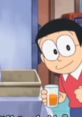 Nobie enjoys a refreshing drink in a kitchen setting, showcasing his cheerful personality and love for fun moments.