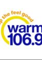 Warm 106.9 logo promoting feel-good music and announcements for listeners to enjoy uplifting tunes.