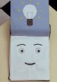 Whimsical sketchbook with a smiling face and light bulb illustration, inspired by "Don't Hug Me I'm Scared.