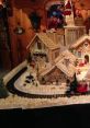 Gingerbread Houses And A Large Village With A Train.