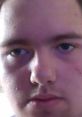 Angry expression of Daniel Freemantle, showcasing intense emotions and frustration in close-up portrait.