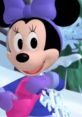 Millie Mouse from Mickey Mouse Clubhouse, wearing winter attire and a big purple bow, smiling in a snowy landscape.