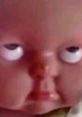 Creepy doll with exaggerated facial expression, showcasing discontent, trending in Littlebro789 memes and social media posts.