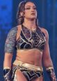 Kris Statlander, a fierce AEW wrestler, showcases her bold ring attire and confident presence during a match.
