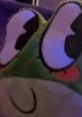 Cute green plush character with large eyes, reminding viewers to set daily time limits for balanced screen time usage.