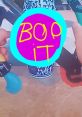 Colorful depiction of the "Bop It" logo, featuring bold text on a vibrant background, symbolizing the 1998 Bop It Extreme game.