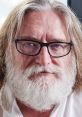 Close-up of a bearded man with glasses, known for contributions to gaming and technology. Gabe HLAGE, industry leader.