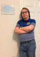 Jared Berriter poses with arms crossed, wearing a striped shirt, embodying an upset Mr. Williams character expression.