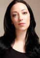 Portrait of Amelia Tyler, the narrator from Baldur's Gate 3, showcasing her striking features and expressive gaze.