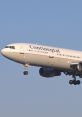 Continental Airlines McDonnell Douglas DC-10 in flight, showcasing aerodynamic design and distinctive livery.
