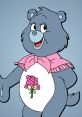 Grams Bear, a beloved character by Pauline Rennie, features a pink bow and rose design, exuding warmth and cheerfulness.