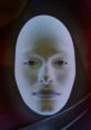 Surreal, expressionless face art piece featuring smooth contours and a ghostly appearance against a dark backdrop.