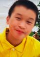 Smiling boy in a bright yellow shirt, showcasing a playful atmosphere perfect for kids' toys and creativity.