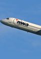 Northwest Airlines Douglas DC-9 in flight, showcasing classic design and GPWS technology in clear blue sky.