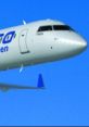 Bombardier CRJ series aircraft in flight, showcasing advanced GPWS technology for enhanced safety and navigation.