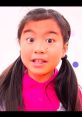 Excited child in a pink shirt, engaging with "Jannie Toys and Colors" theme, showcasing playful expressions.