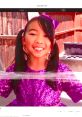 Lucy smiles brightly while playing in her purple sequined outfit during a fun adventure with Toys and Colors.