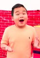 Joyful child in pastel shirt, excitedly exploring toys and colors in a vibrant playroom setting. Perfect for creative inspiration.