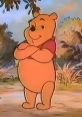 Winnie the Pooh poses confidently in a colorful forest scene from "The New Adventures of Winnie the Pooh.