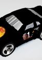 lack race car toy with silver detailing, featuring sponsorship logos, perfect for collectors and racing enthusiasts.