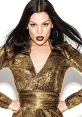 Stylish woman with long dark hair, wearing a shimmering gold outfit and bold makeup, exuding confidence and glamour.