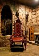 Gothic throne chair in a stone-walled room, evoking a mysterious atmosphere for immersive experiences at Interro.