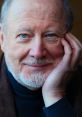 Portrait of David Ogden Stiers, showcasing his thoughtful expression and distinctive features.