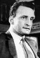 George C. Scott in a classic portrait, showcasing his charismatic presence and distinctive style from the mid-20th century.