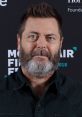 Nick Offerman with a beard, wearing a black shirt, at the Montclair Film Festival 2018, displaying his signature look.