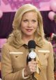 Veronica Corningstone, a confident news anchor, holds a microphone at an event, embodying newsroom elegance and style.