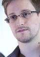 Close-up of Edward Snowden, known for his NSA whistleblowing, highlighting his glasses and thoughtful expression.