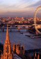 A stunning view of London at sunset, featuring the London Eye, River Thames, and iconic architecture along the waterfront.