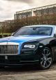 Luxury Rolls-Royce Wraith showcasing elegant design with a striking blue and black color combination, parked outdoors.