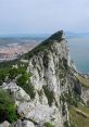 Majestic view of the Rock of Gibraltar, showcasing its steep cliffs and scenic coastal landscape.