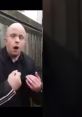 Man with a distressed expression gestures emphatically in a tense situation, embodying the theme of a panicking nonce.