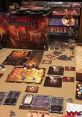 Gloomhaven board game setup showcasing character figures, tiles, and game components for an immersive tabletop experience.