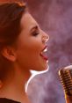 Woman singing passionately into a vintage microphone, surrounded by a smoky atmosphere, showcasing vocal talent.