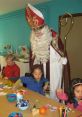 Sinterklaas surrounded by children engaged in creative activities, celebrating the joy of Sinterklaas voorlezen mk 1.