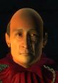 Haskill from Oblivion with a solemn expression, wearing a red robe, set against a dark background.