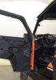Open door of a rugged off-road vehicle showcasing durable design and interior features for outdoor adventure enthusiasts.