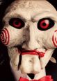 Iconic horror puppet from the *Saw* franchise, featuring striking red eyes and signature spiral designs.