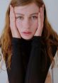 Portrait of a young woman with long hair, expressing creativity and emotion, perfect for promoting "Very Fast Ultra - Luna Sings Hip Hop.