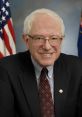 Portrait of Bernie Sanders smiling in a dark suit with a patterned tie, American flag in background, symbolizing political leadership.