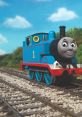 Thomas the Tank Engine travels on the railway, surrounded by greenery and a bright blue sky, showcasing adventure and fun.