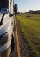 Transport The of a bustling Autopista fills the air, as trucks and cars zoom past on the highway. The rumble of large