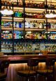 Stylish bar showcasing a wide selection of spirits and elegant decor, perfect for a relaxing night out.