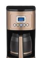 Coffee-Maker The sharp whirring of the Nespresso coffee maker filled the kitchen, signaling the start of a new day. As the