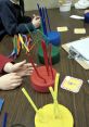Small-Group The small group sat around the table, their subdued voices blending together as they discussed the issue at