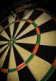 Darts As you step into a crowded dart bar, the first that hits you is the sharp *thud* of darts being thrown. The room is
